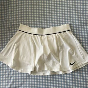 Nike Tennis Skirt size L in girls or Xsmall in women’s.